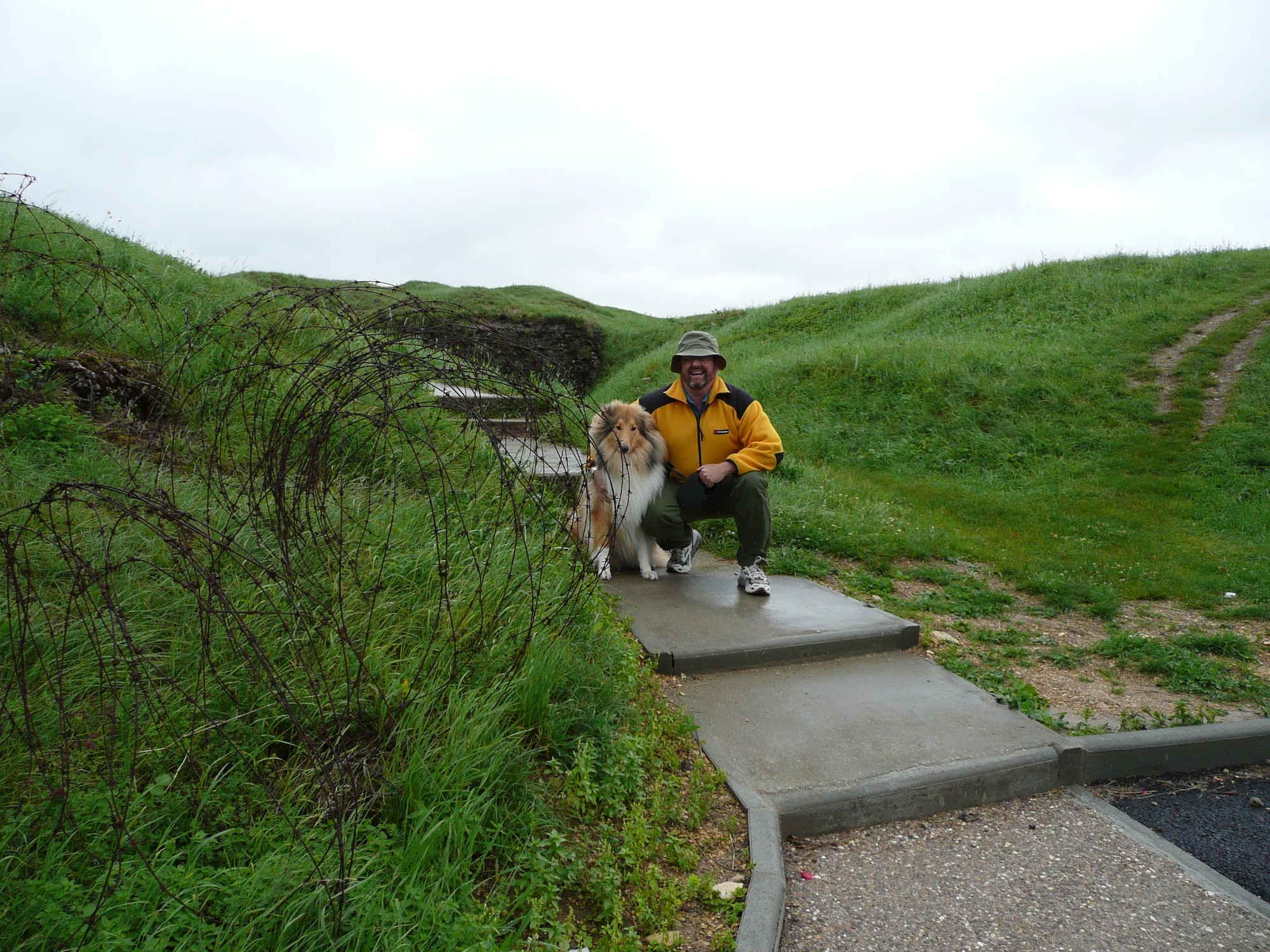 Bill Harris, 48th Fighter Wing historian and Rufus the Collie pose for a photograph at Ft. Vaux, Verdun. According to Mr. Harris, in his commentary titled “The Silencing Mother of Verdun,” published Nov. 12, 2008, “Verdun, like many battles of the First World War, was the scene of incredible bravery and savage slaughter. Even today, the tortured landscape still bear the scars of thousands of shell craters, human bone fragments, and shell splinters. Verdun is to the French as the Somme is to the British and Gettysburg to the Americans.” (Courtesy photo.)