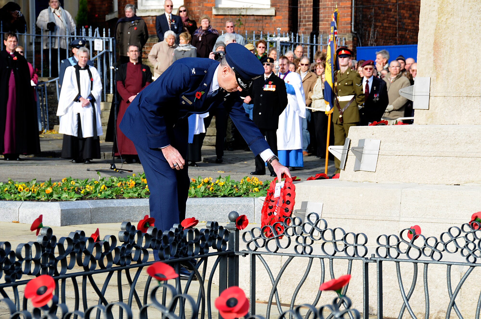 Colonel Scott Reed, 48th Fighter Wing vice commander, lays a poppy wreath at the foot of Angel Hill Memorial in Bury St. Edmunds, England, Nov 9. Airmen from RAF Lakenheath participated in Remembrance Day ceremonies by honoring those who fought by laying wreaths at various memorials throughout East Anglia. (U.S. Air Force photo by Senior Airman Brian J. Ellis)
