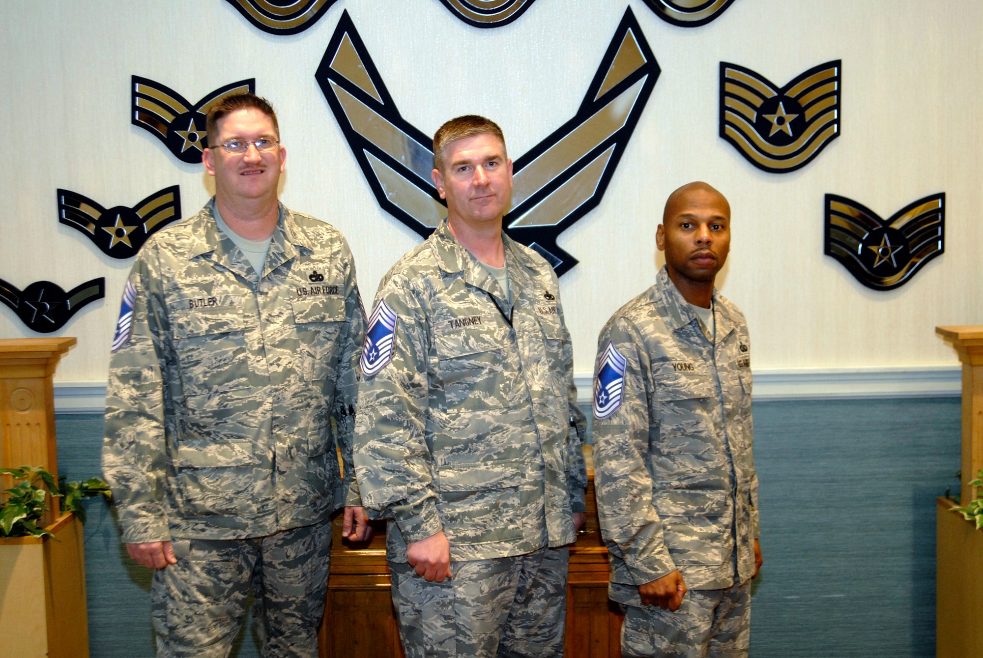 Senior Master Sgts. Stephen M. Butler, 8th Logistics Readiness Squadron, Dennis J. Tangney, 8th Maintenance Squadron, and Michael A. Young, 8th Communications Squadron, get together before their promotion party after being selected for promotion to the rank of chief master sergeant Nov. 13, 2008. (U.S. Air Force Photo by SSgt Jason Colbert)