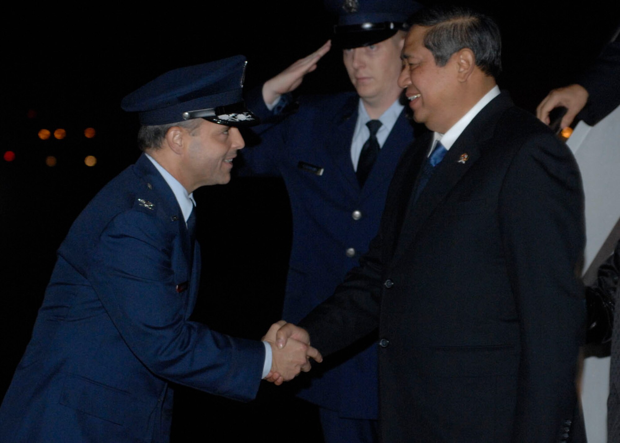 Colonel Eric A. Snadecki, 316th Wing vice commander, greets Indonesian President Susilo Bambang Yudhoyono at Andrews Air Force Base Md.,  Nov.14, 2008, for the two-day G20 Summit at the White House in Washington.  The summit, hosted by U.S. President George W. Bush, will bring together world leaders to discuss the increasing global financial crisis, its causes and efforts to resolve it.  (U.S. Air Force photo by Airman 1st Class Melissa V. Rodrigues)