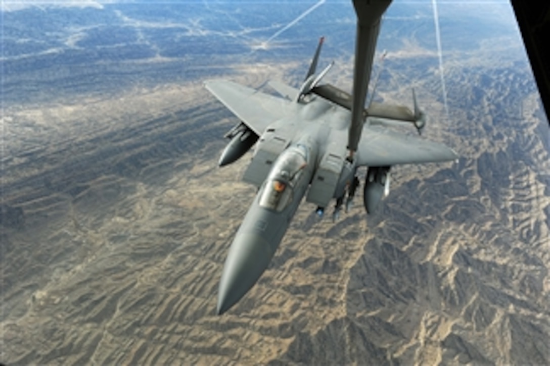 A U.S. Air Force KC-10 Extender aircraft from the 908th Expeditionary Aerial Refueling Squadron refuels a U.S. Air Force F-15E Strike Eagle over Afghanistan on Nov. 7, 2008.  