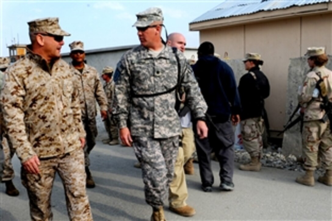 Vice Chairman of the Joint Chiefs of Staff U.S. Marine Gen. James E. Cartwright talks to U.S. Army Lt. Col. David Chase during a visit to Forward Operating Base Fenty, Afghanistan, Nov. 13, 2008. Chase, deputy commander of the 3rd Brigade Combat Team, 2nd Infantry Division, gave updates to operations in the area.