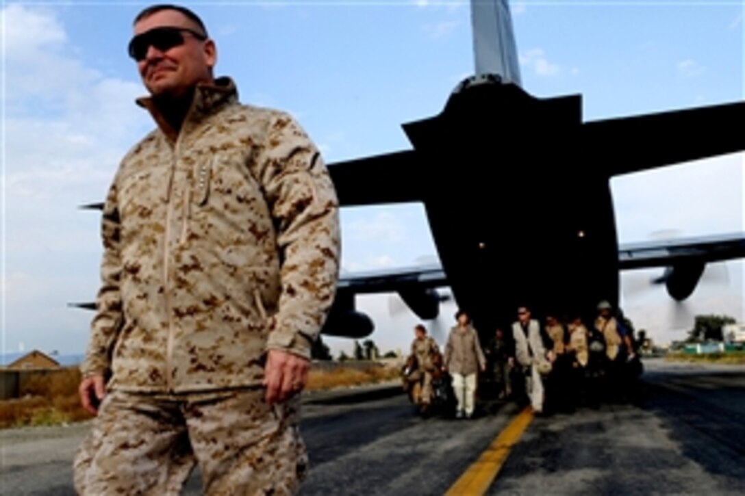 Vice Chairman of the Joint Chiefs of Staff U.S. Marine Gen. James E. Cartwright steps off a C-130 during a visit to Forward Operating Base Fenty, Afghanistan, Nov. 13, 2008. Cartwright brought USO entertainers to meet troops, take pictures with them and sign autographs.