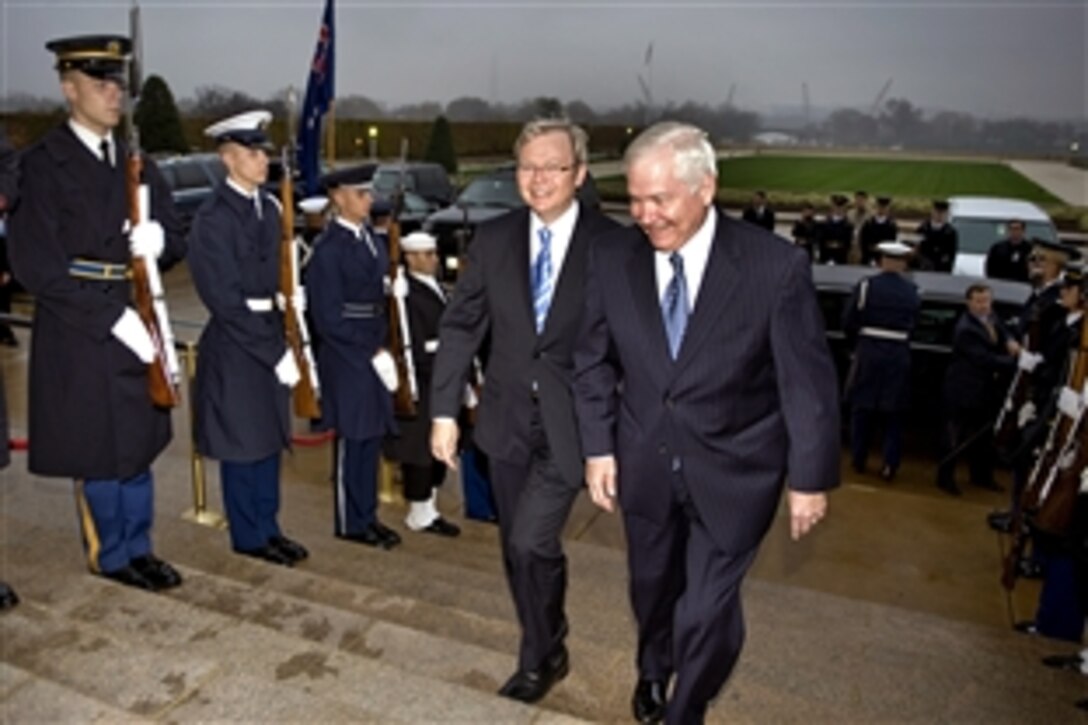 Defense Secretary Robert M. Gates walks through an honor cordon with Australian Prime Minister Kevin Rudd at the Pentagon, Nov. 14, 2008.  The two met to discuss bilateral defense issues. 