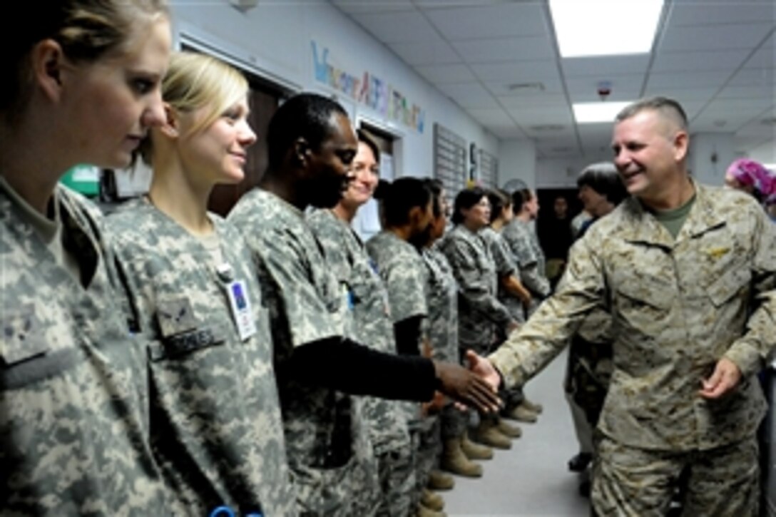 Vice Chairman of the Joint Chiefs of Staff U.S. Marine Gen. James E. Cartwright thanks airmen at the 455th Expeditionary Group for their work during a visit to Bagram Air Base, Afghanistan, Nov. 14, 2008. Cartwright toured the group's hospital to learn about health care for wounded servicemembers. 