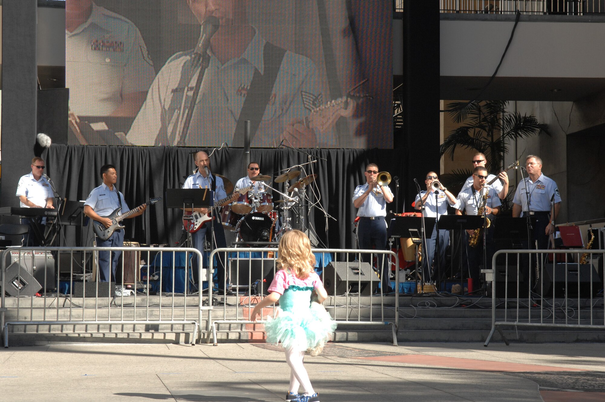 A young girl dances to the beat of the Air National Guard's Band of the Southwest at the Air Force Expo, Nov. 15. The Expo is one of many activities planned in Southern California during Air Force Week, Nov. 14-21. (Photo by SSgt Gallardo)