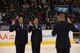 Col. John Odey swears in Tech. Sgt. Surita Rorie and Staff Sgt. Robert Coddington on the ice of the Staples Center, Los Angeles, Calif., Nov. 15. Sergeants Rorie and Coddington reenlisted during a Los Angeles Kings vs. Nashville Predator game as part of Air Force Week Los Angeles. Colonel Odey is the 95th Communications Group Commander, Edwards Air Force Base, Calif. Sergeants Rorie and Coddington are stationed at Edwards Air Force Base, Calif. Air Force Week Los Angeles is an event designed to educate the local population about the Air Force's capabilities and missions through various activities and exhibitions all over the Los Angeles area. It provides an up close and personal look at the men and women of the Air Force serving worldwide in the defense of freedom. Air Force Week Los Angeles runs from Nov. 14 to 21. (U.S. Air Force photo/Staff Sgt. Desiree N. Palacios)