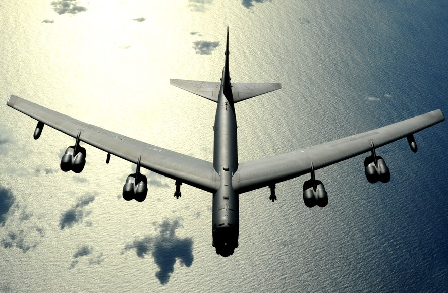A B-52 Stratofortress from Minot Air Force Base, N.D. flies over the Pacific Ocean on Nov. 12, 2008. The B-52 is deployed to Andersen A.F.B. Guam, 23rd Expeditionary Bomb Squadron and is part of a continuing operation of maintaining a bomber presence in the region. (U.S. Air Force photo by: Master Sgt. Kevin J. Gruenwald) released   
