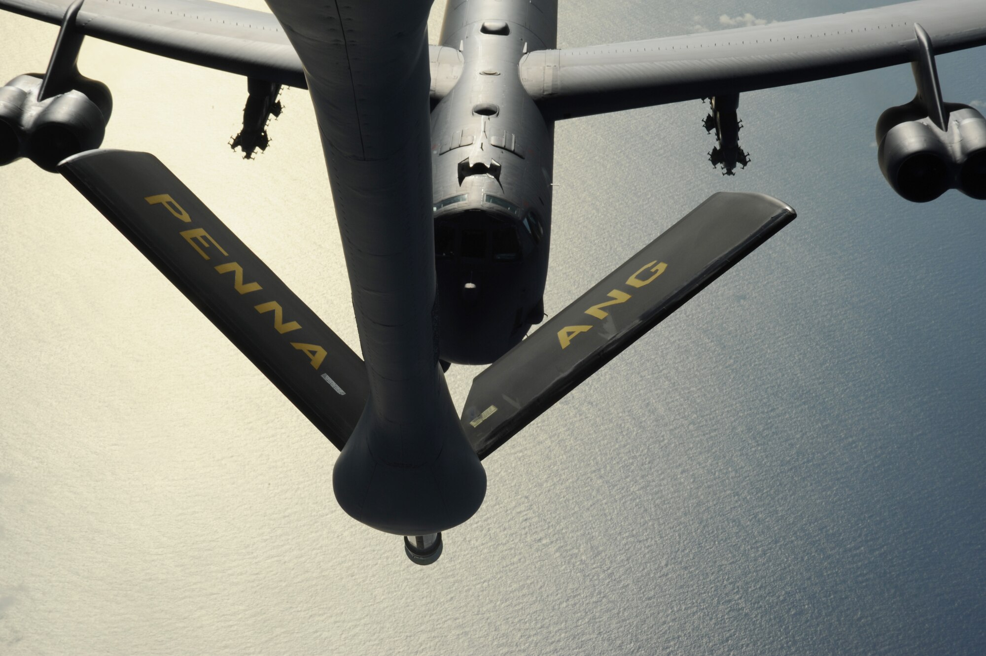A B-52 Stratofortress from Minot Air Force Base, N.D. moves into a pre-contact position to receive fuel from a K-135 Stratotanker over the Pacific Ocean on Nov. 12, 2008. The B-52 is deployed to Andersen A.F.B. Guam, 23rd Expeditionary Bomb Squadron and is part of a continuing operation of maintaining a bomber presence in the region. The KC-135 is assigned to the 171st Air Refueling Wing Pennsylvania Air National Guard and is deployed to Andersen A.F.B in support of Pacific theater refueling operations.(U.S. Air Force photo by: Master Sgt. Kevin J. Gruenwald) released   