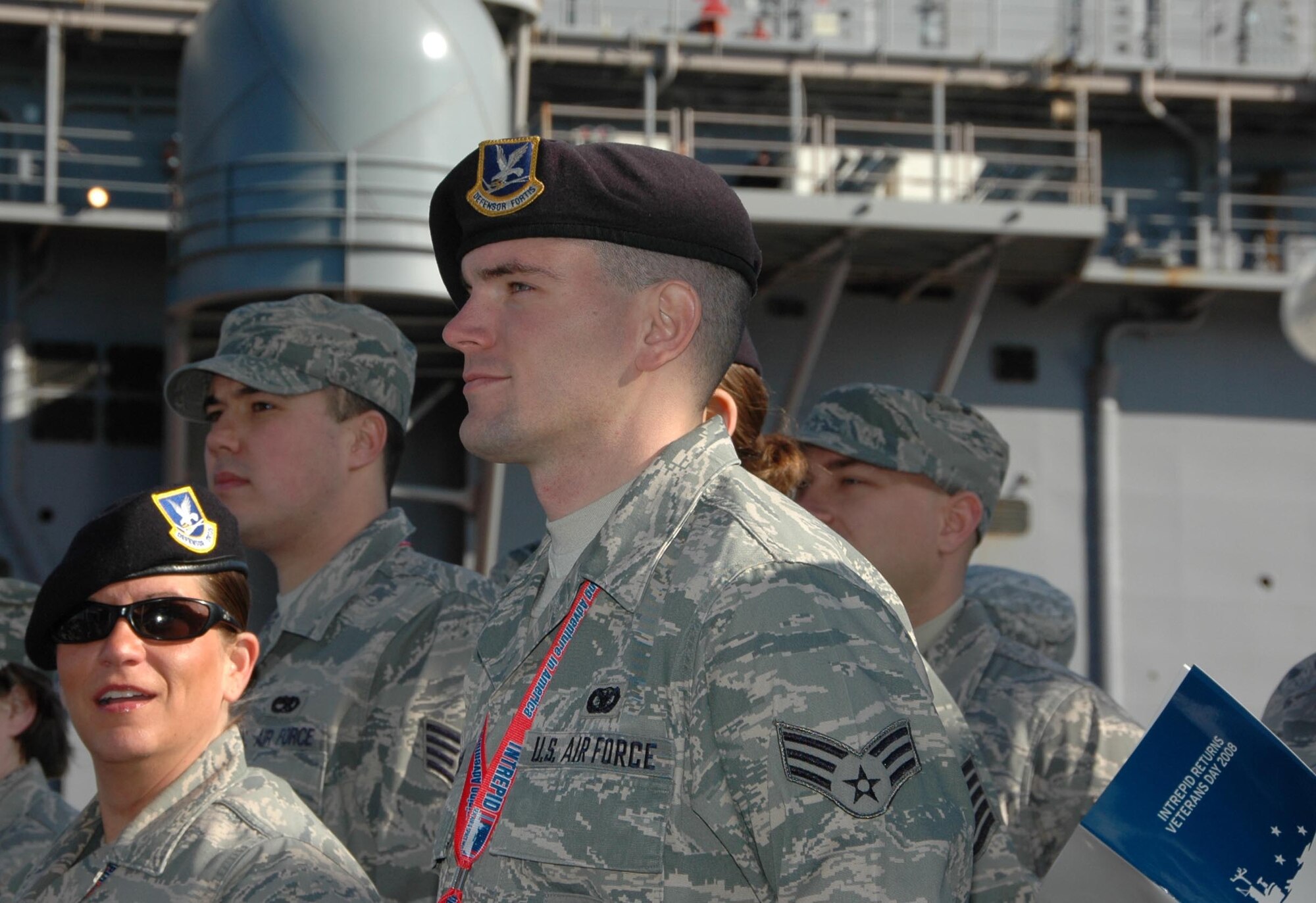 MCGUIRE AIR FORCE BASE, N.J. -- Senior Airman Chris Wilson waits for the arrival of President George W. Bush during the grand reopening and re-christening of the Intrepid Sea, Air and Space Museum on Pier 86 in New York City.  Airman Wilson is one of nearly 400 active duty, Guard and Reserve Air Force members to march down Fifth Ave., Nov 11 during the annual New York City Veterans Day Parade. (U.S. Air Force photo/Master Sgt. Donna T. Jeffries)