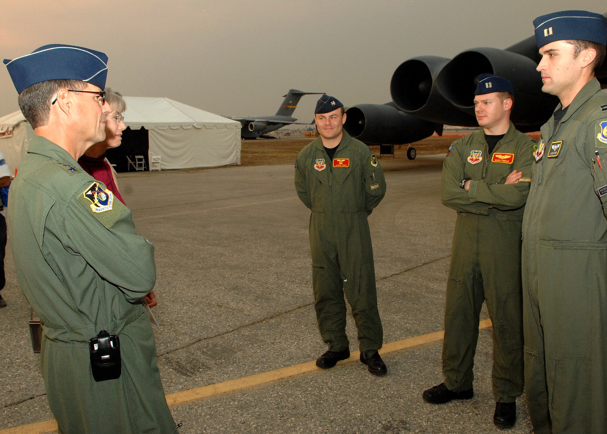 U.S. Air Force Lieutenant General John T. Sheridan, Commander, Space and Missile Systems Center, Air Force Space Command, Los Angels Air Force Base, California, Talks to the crew of a B52H Bomber from Minot Air Force Base, North Dakota, during Wings Over Long Beach at the Long Beach Airport, November 15, 2008.  (U.S. Air Force photo by Senior Airman Matthew Smith)
