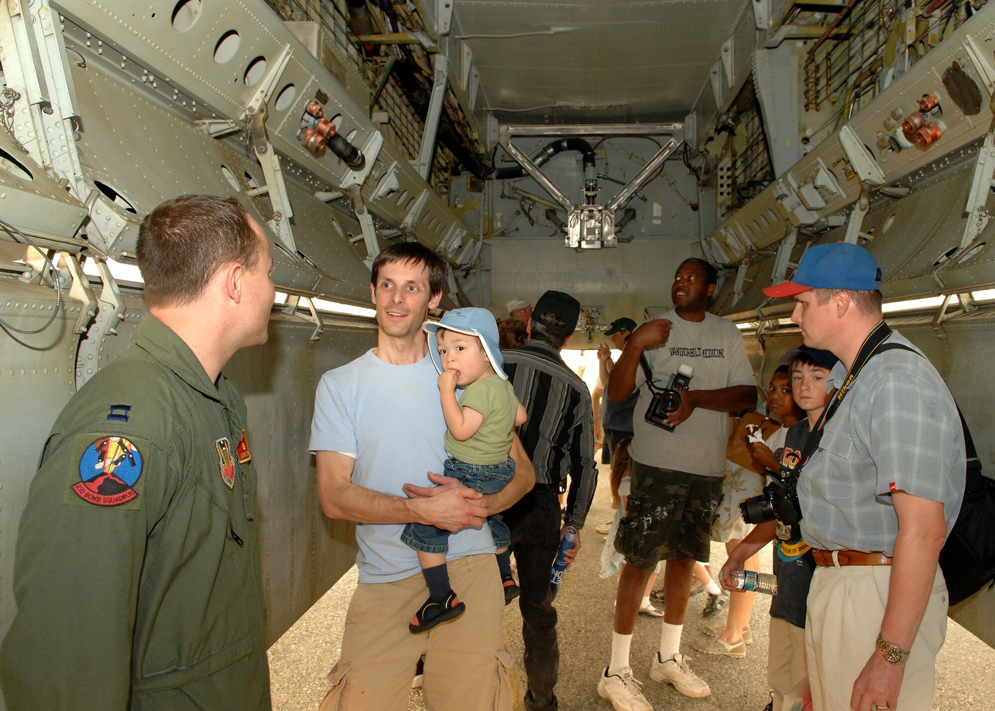 U.S. Air Force Captain Jarred Prier an Electronic Warfare Officer with the 23d Bomb Squadron, Minot Air Force Base, North Dakota talks to visitors in the bomb bay of an B52H bomber during Wings Over Long Beach at the Long Beach Airport, November 15, 2008.  (U.S. Air Force photo by Senior Airman Matthew Smith)