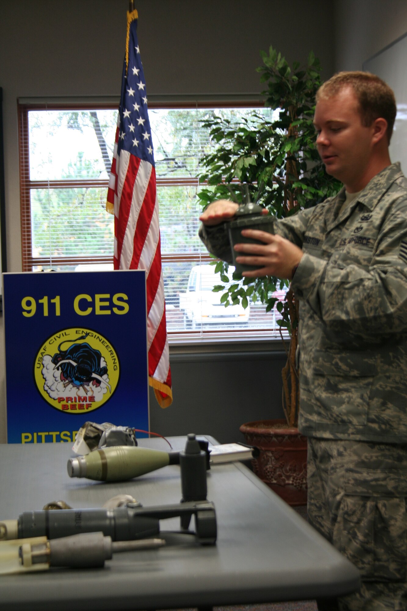 Staff Sgt. Robert Pirkston, an explosive ordinance craftsman with the 94th Civil Engineering Squadron, Dobbins Air Force Base, demonstrates to class members an example of a land mine. Airmen from 22nd Air Force, Dobbins Air Force Base were on hand here during the September Unit Training Assembly to provide explosive Ordinance reconnaissance training to Airmen here in preparation for the upcoming
operational readiness inspection. 

(U.S. Air Force Reserve photo / Staff Sgt. Roberto Modelo)