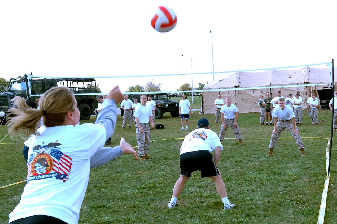 GRISSOM AIR RESERVE BASE, Ind., -- An employee from the Ratheon Corporation based out of Fort Wayne serves up a shot during a volleyball competition as part of a special challenge day held at the Marine Corps complex.