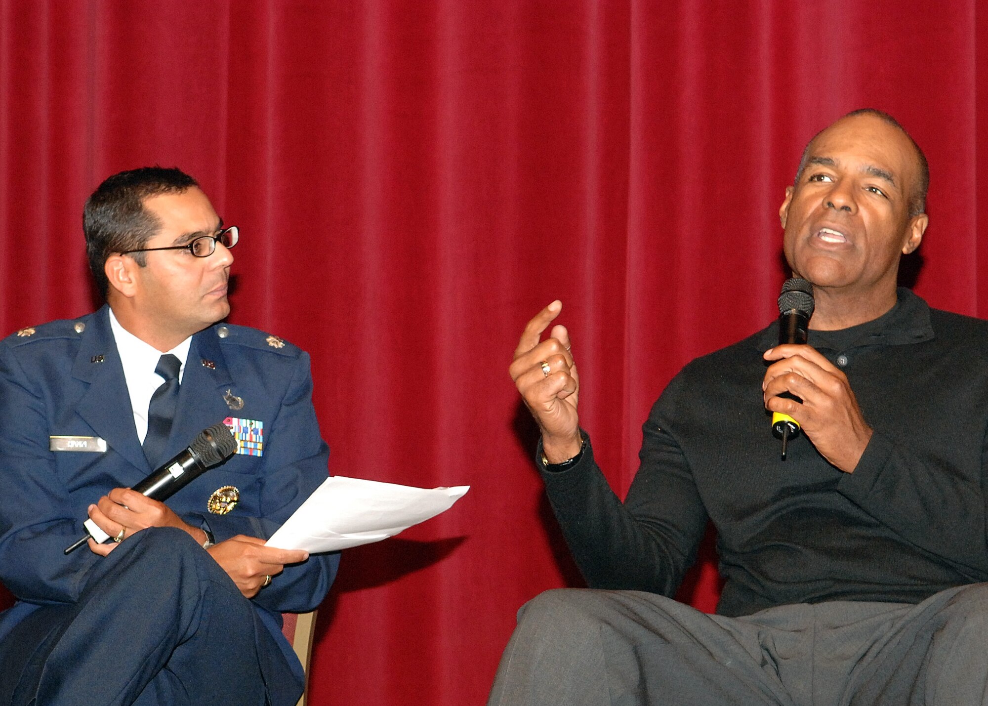Lt. Col. Francisco Hamm, Air Force Entertainment Liasion Office, talks with actor Michael Dorn, Star Trek: Next Generation and Star Trek: DS-9’s Lt. Worf, at the showing of “Star Trek VI: The Undiscovered Country.”  The film was screened as part of the Air Force- themed film festivals held during Air Force Week in Southern California, Nov. 14-21.  (Photo by Senior Airman Ashley Moreno)