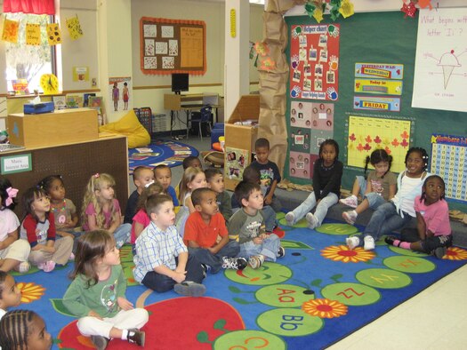 MOODY AIR FORCE BASE, Ga. -- Children from Moody's Youth Center watch the "Magic of Recycling" show here Nov. 13. The show was a part of Moody's American Recycles Day celebration. (Courtesy photo)
