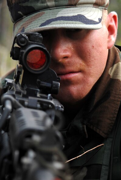 MOODY AIR FORCE BASE, Ga. -- A Moody Airman looks through his scope during an Air Combat Command pre-ranger program course exercise here Nov.12. Candidates must complete 20 hours of training each day for 13 days straight. (U.S. Air Force photo by Airman Joshua Green)