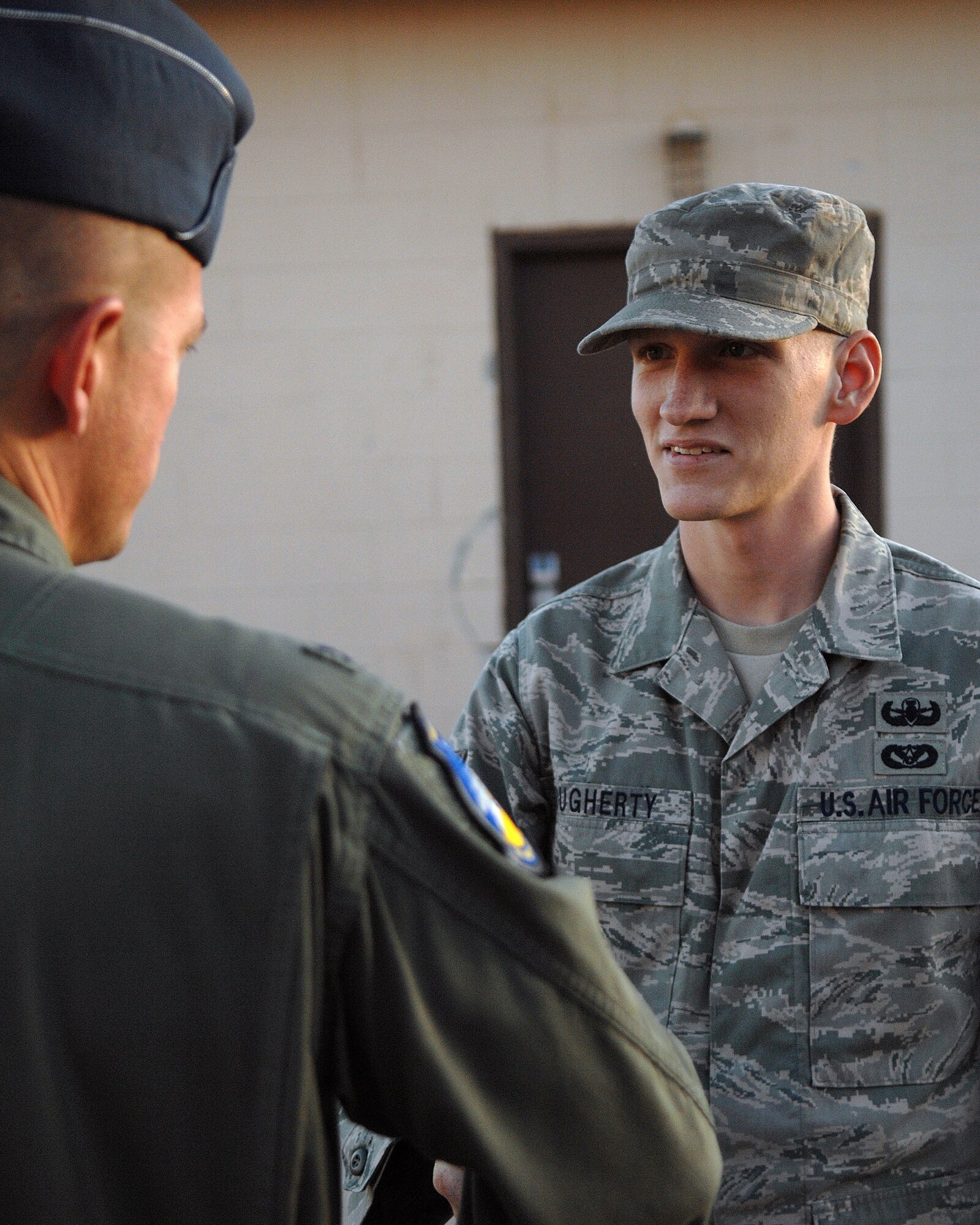 49th Fighter Wing vice commander, Col. Michael McGee, greets Senior Airman Patrick Dougherty, Nov. 13, after returning from a six month deployment to Afghanistan. Airman Dougherty is an explosive ordnance apprentice assigned to the 49th Civil Engineer Squadron (EOD) at Holloman Air Force Base, N.M.

(U.S. Air Force photo/Senior Airman Anthony nelson Jr)