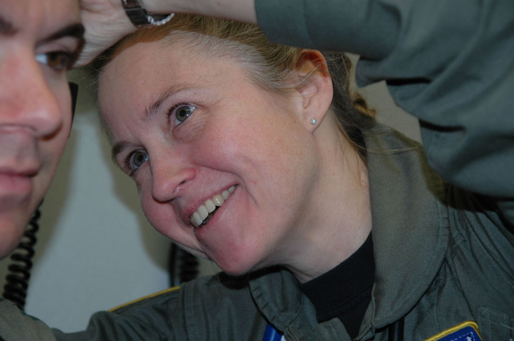 Lt. Col. (Dr.) Colleen Kelley, chief of flight medicine with the 439th Aerospace Medicine Squadron, examines a patient during a weekend unit training assembly. Colonel Kelley joined the Air Force Reserve at age 40 and has been at Westover Air Reserve Base, Mass., for nearly nine years. (U.S. Air Force photo/Senior Master Sgt. Sandi Michon)
