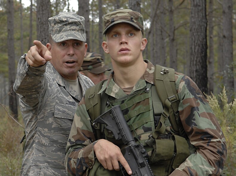 MOODY AIR FORCE BASE, Ga. -- Senior Master Sgt. Darryl Lebouef, 820th Security Forces Group, identifies to an Airman Ranger candidate's where his area of responsibility while preforming perimeter security duties here Nov. 13. Sergeant Lebouef is one of many Air Force Ranger-qualified Airmen who assisted with the 13 days of training. (U.S. Air Force photo by Senior Airman Javier Cruz)