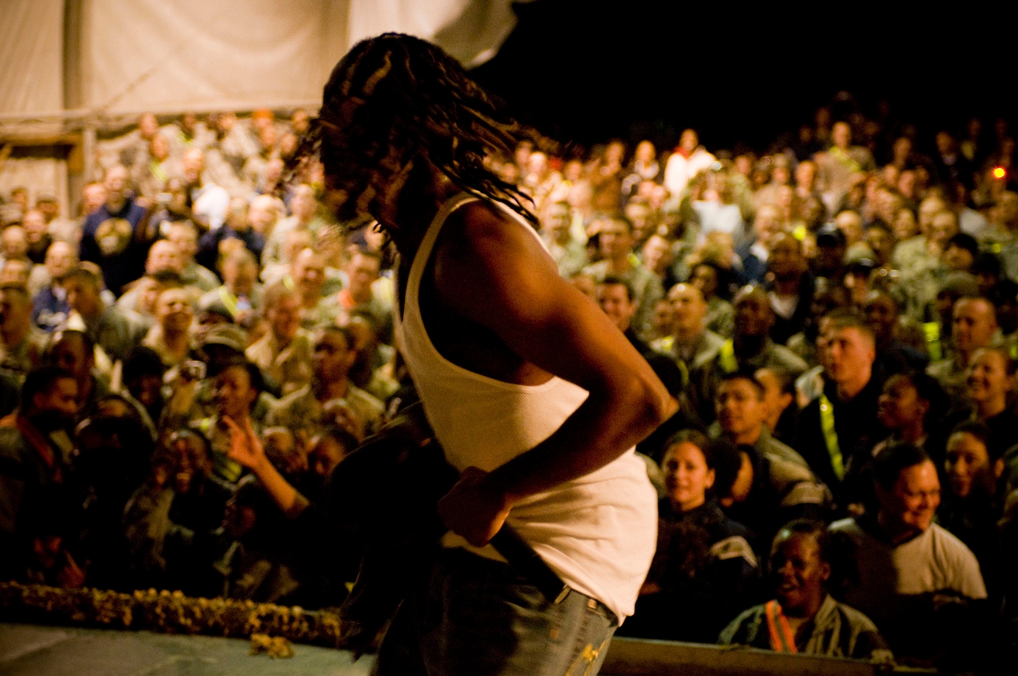 Kaine of the rap group Yin Yang Twins performs Nov. 13 at Bagram Airfield, Afghanistan. The Yin Yang Twins were part of the USO Tour entitled "Around the World in 8 Days. "(U.S. Air Force photo/Staff Sgt. Samuel Morse) 
