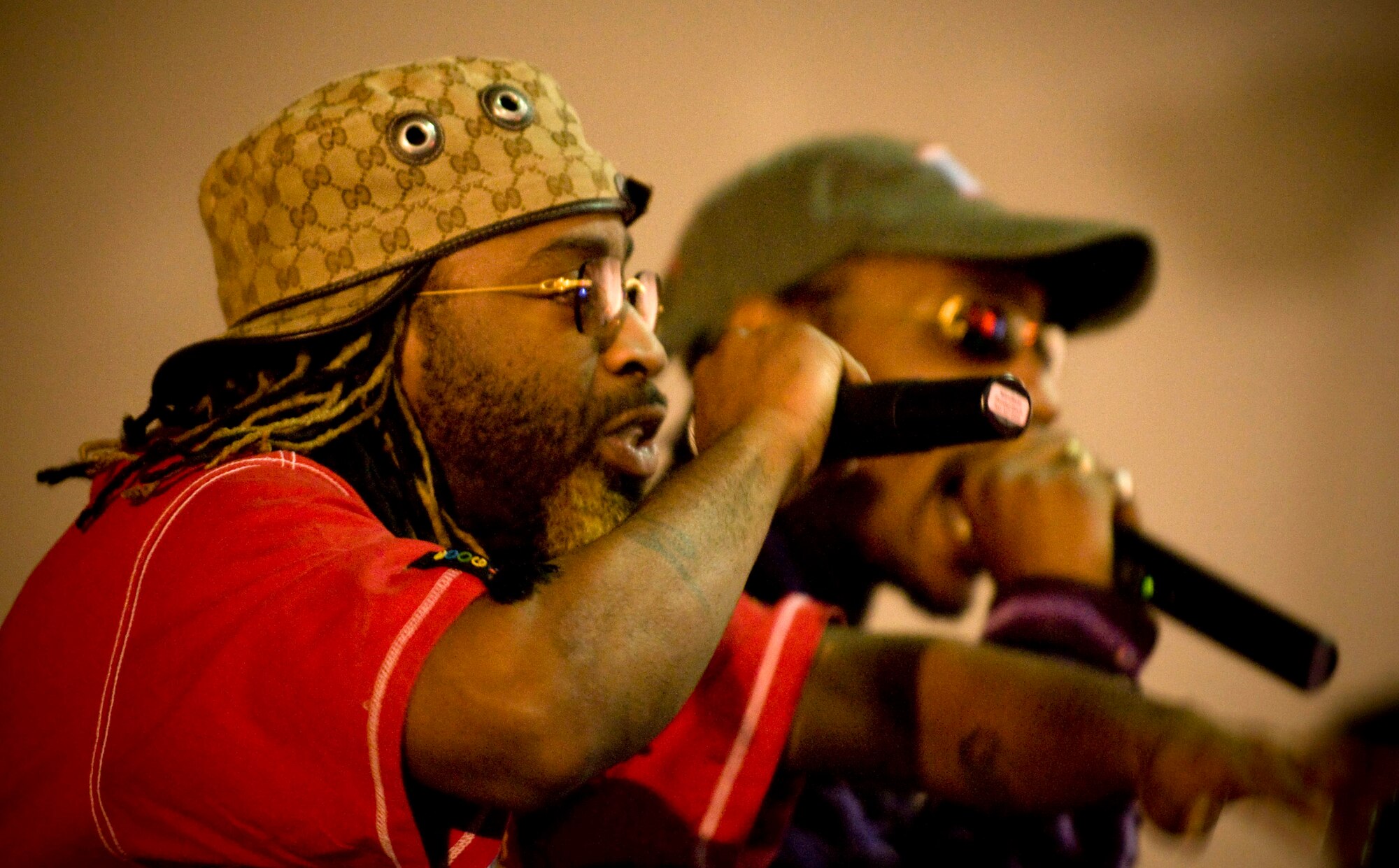 Kaine and D-Roc of the rap group Yin Yang Twins perform Nov. 13 at Bagram Airfield, Afghanistan. The Yin Yang Twins were part of the USO Tour entitled "Around the World in 8 Days. "(U.S. Air Force photo/Staff Sgt. Samuel Morse)
