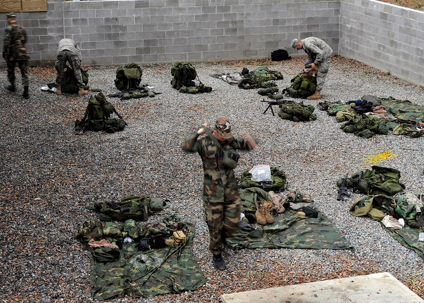 MOODY AIR FORCE BASE, Ga. -- Airmen participating in a Ranger Training course pack their bags and prepare to leave on a patrol here Nov. 14. The course is physically and mentally challenging. (U.S. Air Force photo by Senior Airman Brittany Barker) 