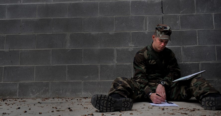 MOODY AIR FORCE BASE, Ga. – An Airman makes a diagram during Ranger training here Nov. 14. Airmen are required to perform combat scenerio situations with little to no sleep. (U.S. Air Force photo by Senior Airman Gina Chiaverotti)