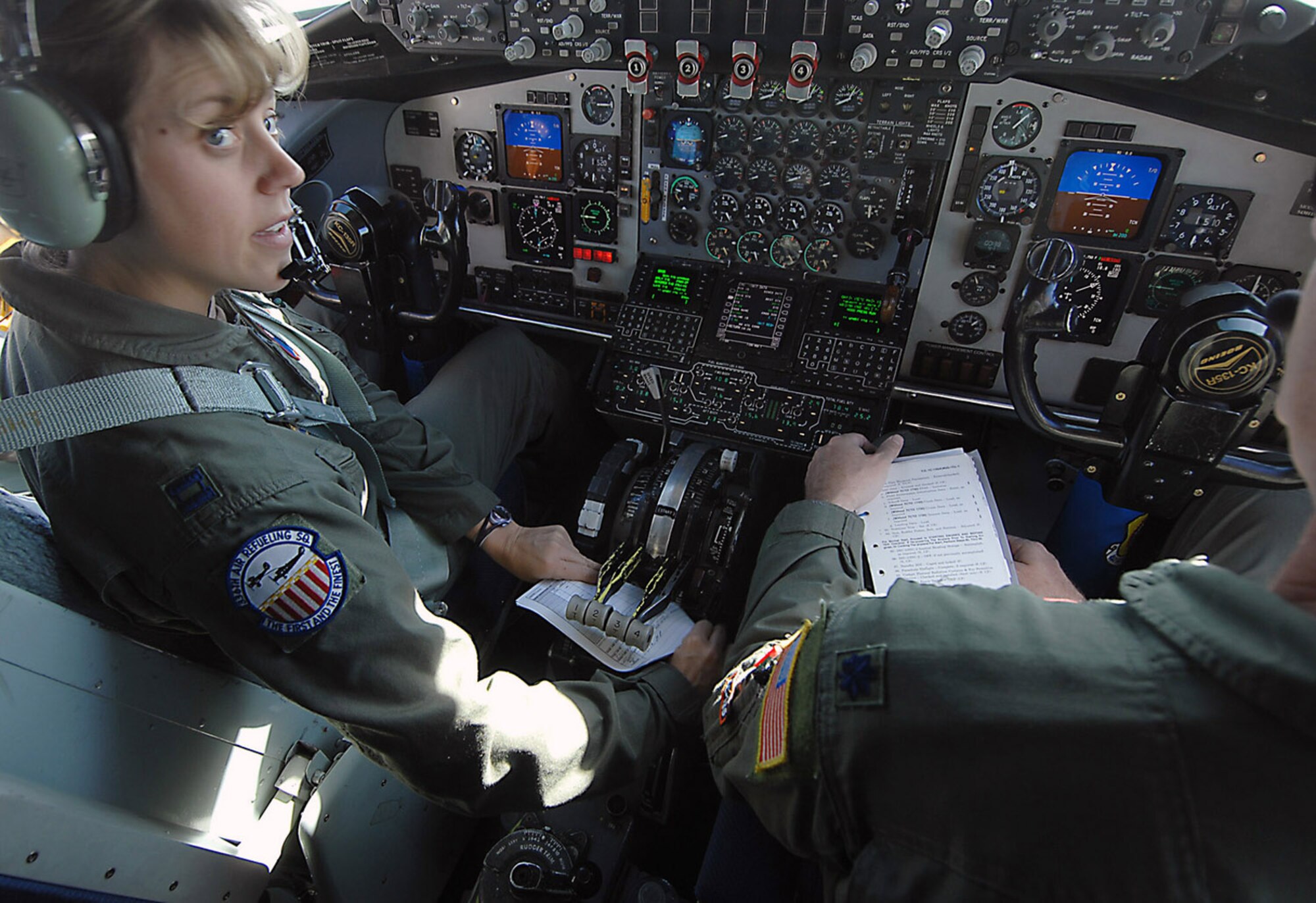 Capt. Kimberly Link preflight checks an Air Force Reserve Command KC-135 Stratotanker prior to a media flight for Air Force Week Los Angeles Nov. 12 at March Air Reserve Base, Calif. Captain Link is a pilot from the 336th Air Refueling Squadron. (U.S. Air Force photo/Master Sgt. Rick Sforza)