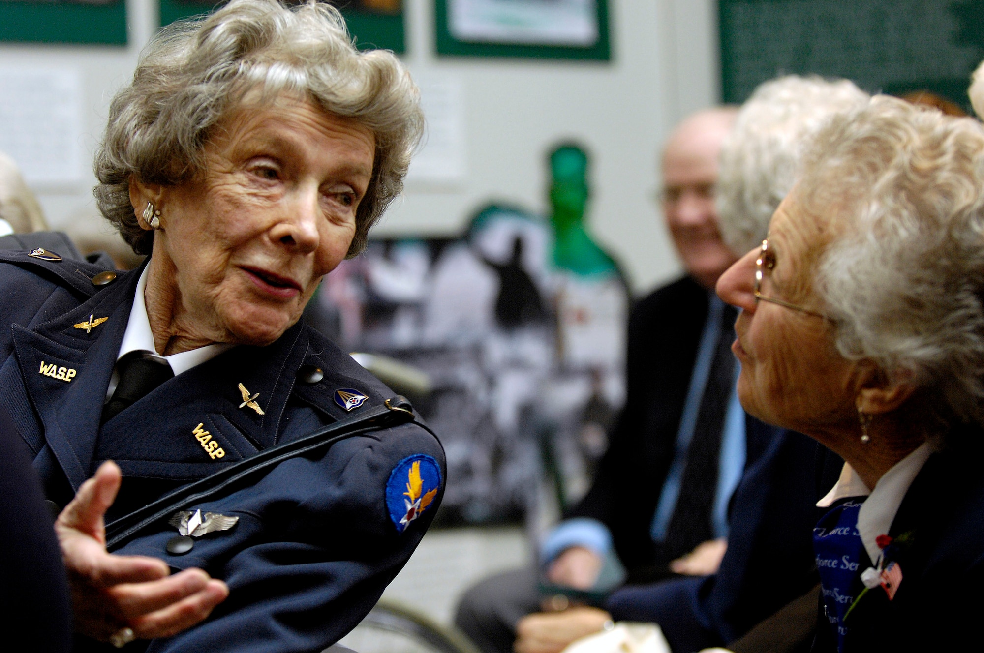 Bernice Haydu and Lillian Yonally, World War II Women Airforce Service Pilots, visit while attending the "Fly Girls of World War II" exhibit which opened in their honor Nov. 14 at the Women in Military Service for America Memorial in Arlington, Va.  Approximately 25 WASPs attended the opening ceremony.  WASPs were the first U.S. military-trained women aviators in history.  (U.S. Air Force photo/Scott M. Ash)