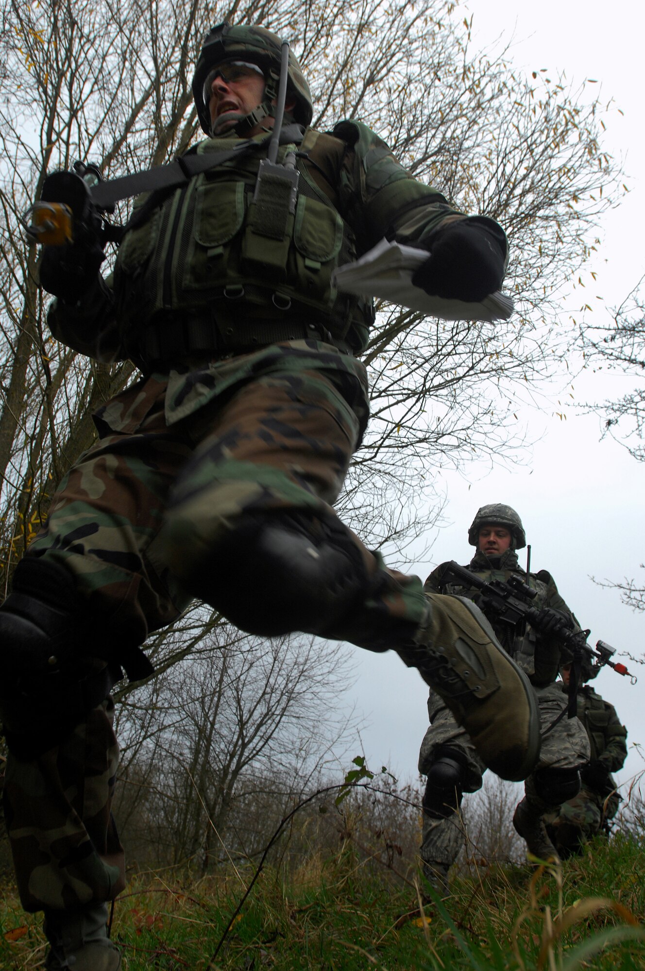 Tech. Sgt. Will Stevens, 422nd Security Forces Squadron, Royal Air Force Croughton, leads his squad back to their vehicles during a Mounted Operations exercise, Nov. 15, 2008, Baumholder, Germany. During this two-day exercise, students were taught convoy and patrol techniques.  (U.S. Air Force photo Airman 1st Class Kenny Holston)
