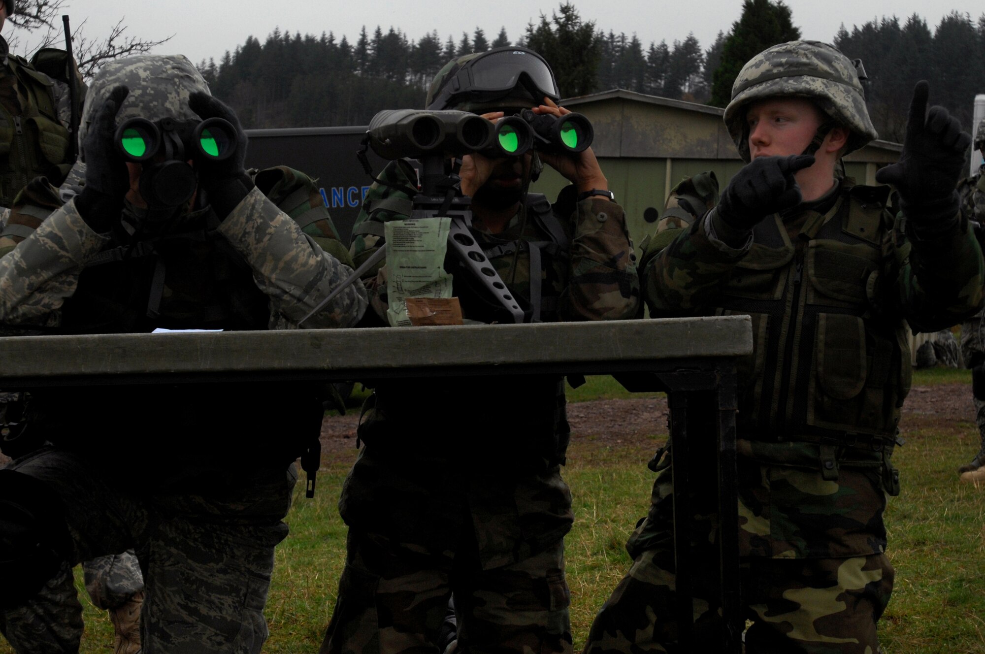 U.S. Air Force Security Forces Squadron members perform range estimation during a Mounted Operations exercise, Nov. 15, 2008, Baumholder, Germany. During this two-day exercise, students were taught convoy and patrol techniques.  (U.S. Air Force photo Airman 1st Class Kenny Holston)
