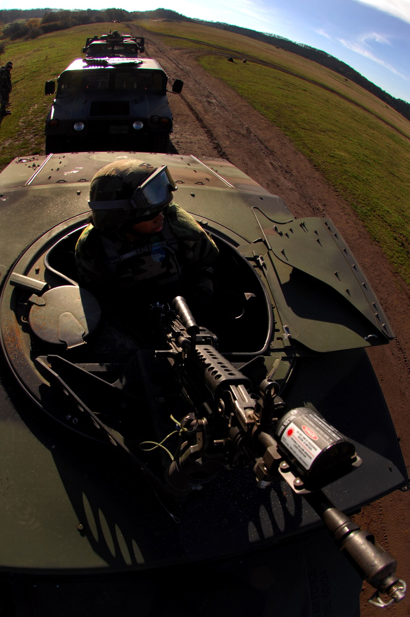 Airman 1st Class Yazmine Nash, 423rd Security Forces Squadron, Royal Air Force Alconbury, acts as the lead turret gunner during a Mounted Operations exercise, Nov. 14, 2008, Baumholder, Germany. During this two-day exercise, students were taught convoy and patrol techniques. (U.S. Air Force photo Airman 1st Class Kenny Holston)