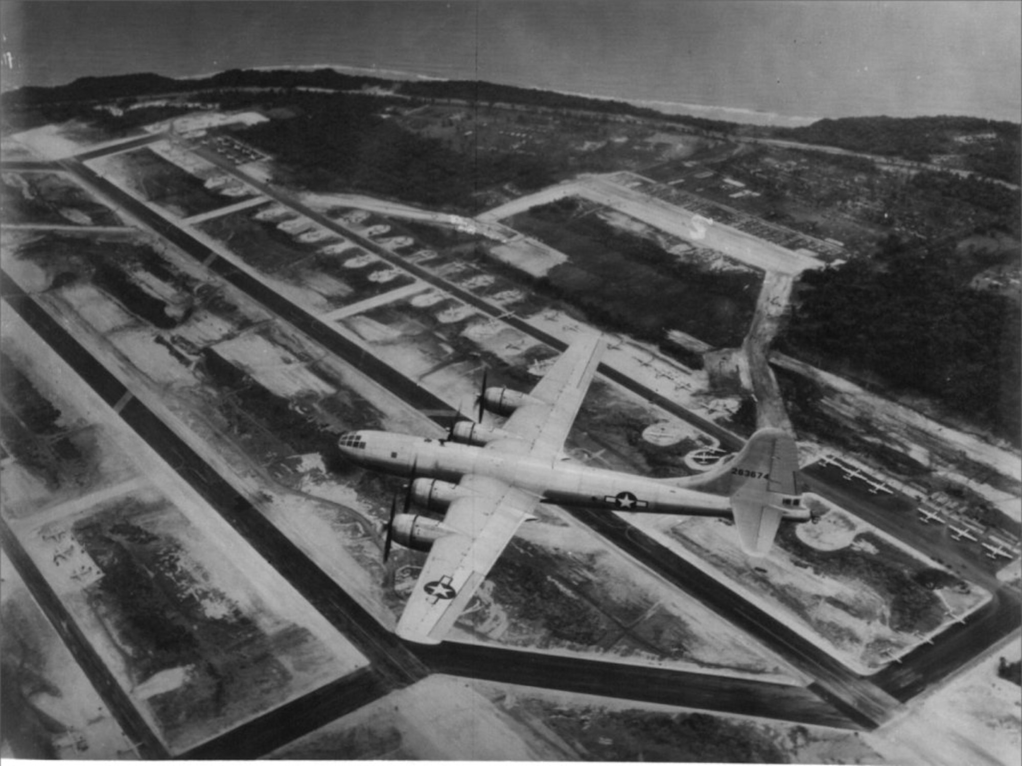 A B-29 in flight over Northwest Field, Guam. Records indicate this particular bomber was assigned to the 315th Bomb Wing, 501st Bomb Group.  (Photo courtesy of the 315th Bombardment Wing circa 1945)