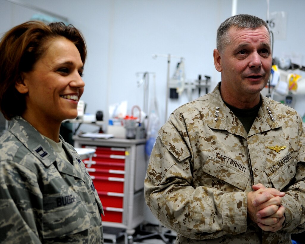 Vice Chairman of the Joint Chiefs of Staff U.S. Marine Gen. James E. Cartwright asks U.S. Air Force Capt. Melissa Buzbee a question about medical equipment to during a visit to Bagram Air Base, Afghanistan, Nov. 14, 2008. Cartwright toured the facility to check on health care for wounded servicemembers. 