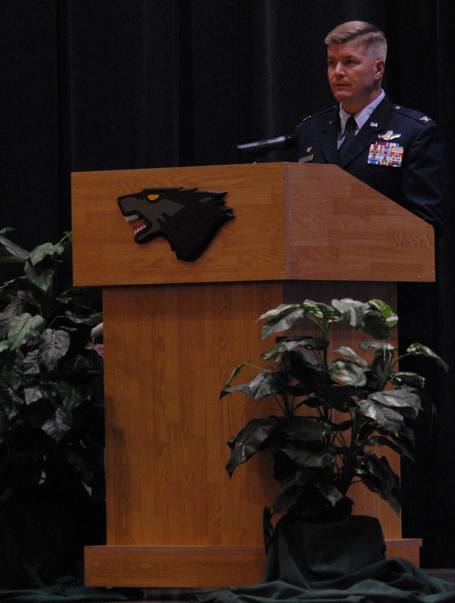 Colonel J.D. "Wolf" Harris, 8th Fighter Wing commander, speaks to Wolf Pack Airmen at a memorial service for Senior Airman Marschelle Harris, 8th Medical Cupport Squadron, Nov. 17. Airman Harris passed away Nov. 12 at nearby Ajou University Hospital in Suwon, Republic of Korea. (U.S. Air Force photo/Senior Airman Gustavo Gonzalez) 
