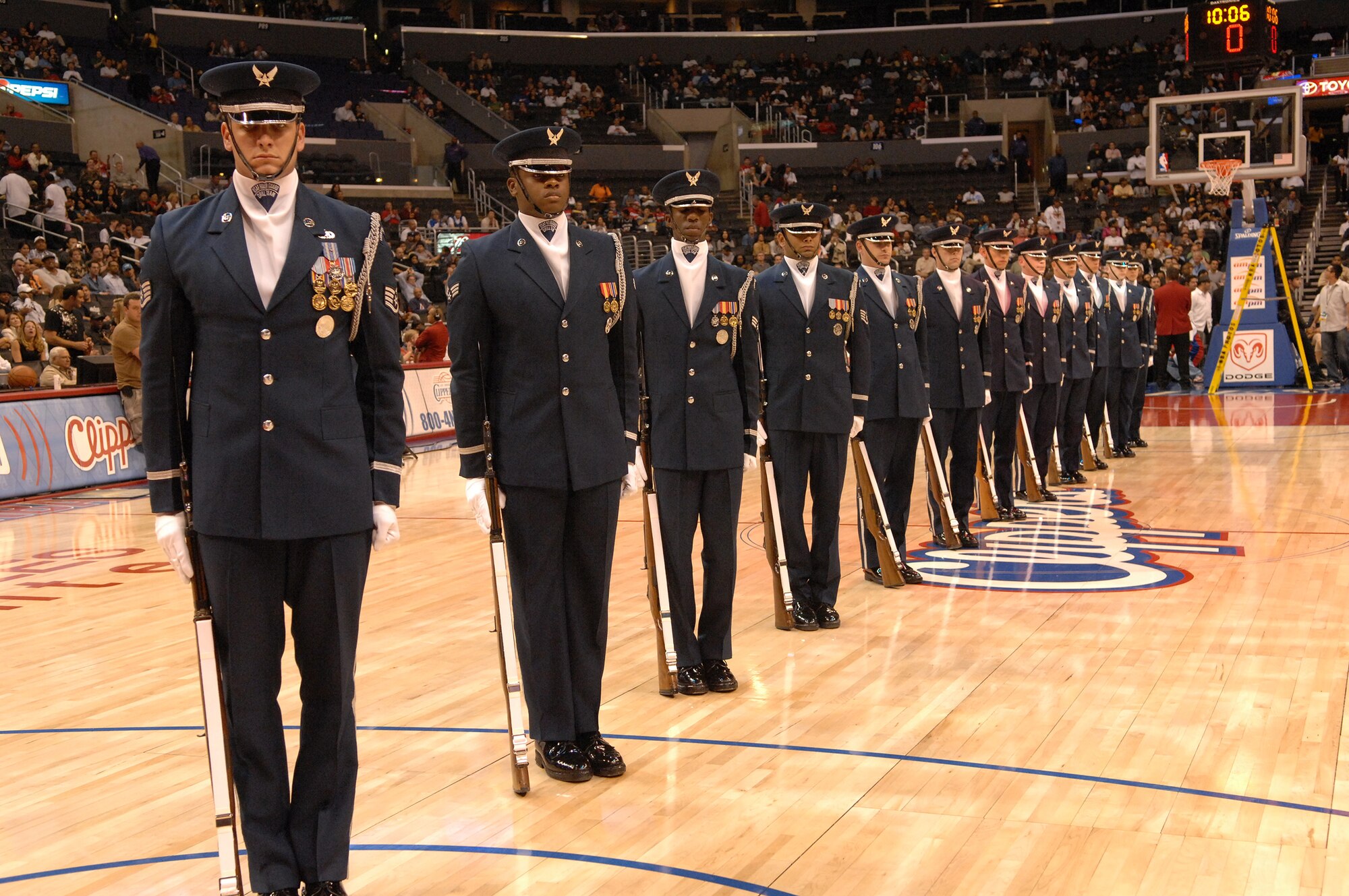 The U.S. Air Force Honor Guard Drill Team performs at the Staples Center in Los Angeles California before the Clippers vs. Spurs basketball game during Air Force Week, Nov. 17. (U.S. Air Force photo by Senior Airman Matthew Smith)