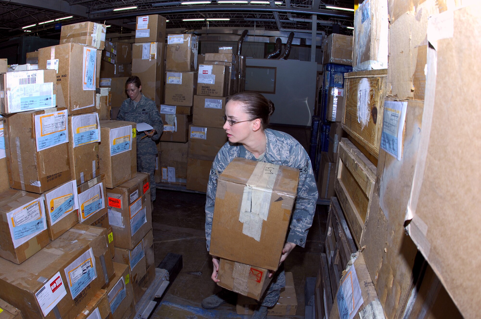 MINOT AIR FORCE BASE, N.D. -- Airman 1st Class Sarah Guisgand, 5th Logistics Readiness Squadron material management apprentice, conducts an inventory validation here recently. Mobility Readiness Spares Packages shop Airmen conduct these inventories every week to ensure parts and supplies are ready to support 5th Bomb Wing aircraft both at home station and while deployed. (U.S. Air Force photo by Airman 1st Class Benjamin Stratton)