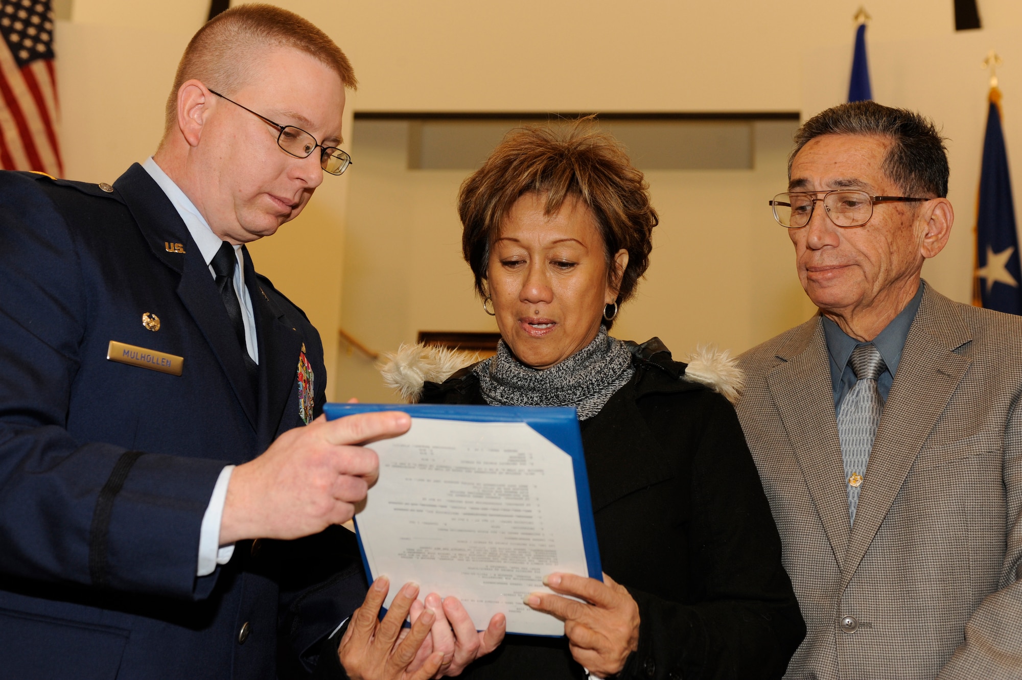Dr. Ishmael and Carmen Stagner, parents of Staff. Sgt. Brandon Stagner, 354th Security Forces Squadron, receive their sons' medal presented by Maj. Gerald Mulhollen, 354th SFS commander, during the memorial service Nov. 14, 2008, at Eielson Air Force Base, Alaska. Friends, family and co-workers gathered together to mourn the loss of Sergeant Stagner who served honorably for 14 years.  (U.S. Air Force photo/Senior Airman Jonathan Snyder)