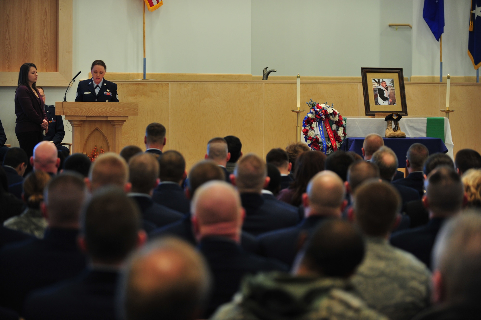 Staff Sgt. Samantha Freeman delivers Staff. Sgt. Brandon Stagner, 354th Security Forces Squadron, memorial service tribute Nov. 14, 2008, at Eielson Air Force Base, Alaska. Friends, family and co-workers gathered together to mourn the loss of Sergeant Stagner who served honorably for 14 years.  (U.S. Air Force photo/Senior Airman Jonathan Snyder)