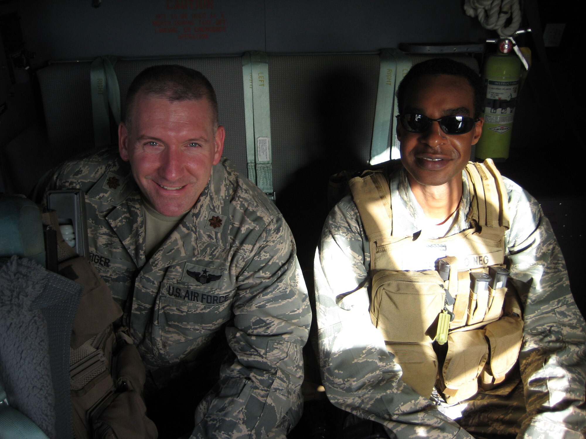 SOUTHWEST ASIA - Maj. Tony Kleiger, on the left, is currently deployed from Langley.  He said the highlight of his tour has been getting to hear Deputy Secretary of Defense, Mr. Gordon England and Gen. David Petraeus speaking after closed door classified briefings and injecting their viewpoints on our progress as Airman and how vital our contributions are to the current fight.  (Courtesy photo)