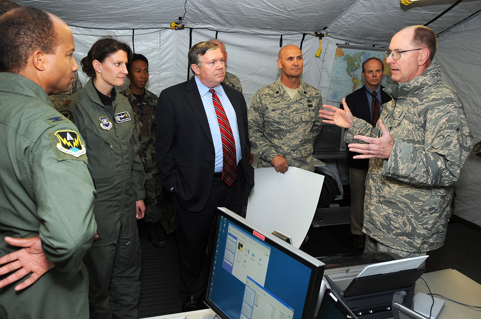 PETERSON AIR FORCE BASE, Colo. -- Gen. C. Robert Kehler, commander of Air Force Space Command, explains the command's requirements to the Eagle Vision team. EV creator, James "Snake" Clark, (center) was on hand to brief the general on the system's capabilities. (U.S. Air Force photo by Duncan Wood)