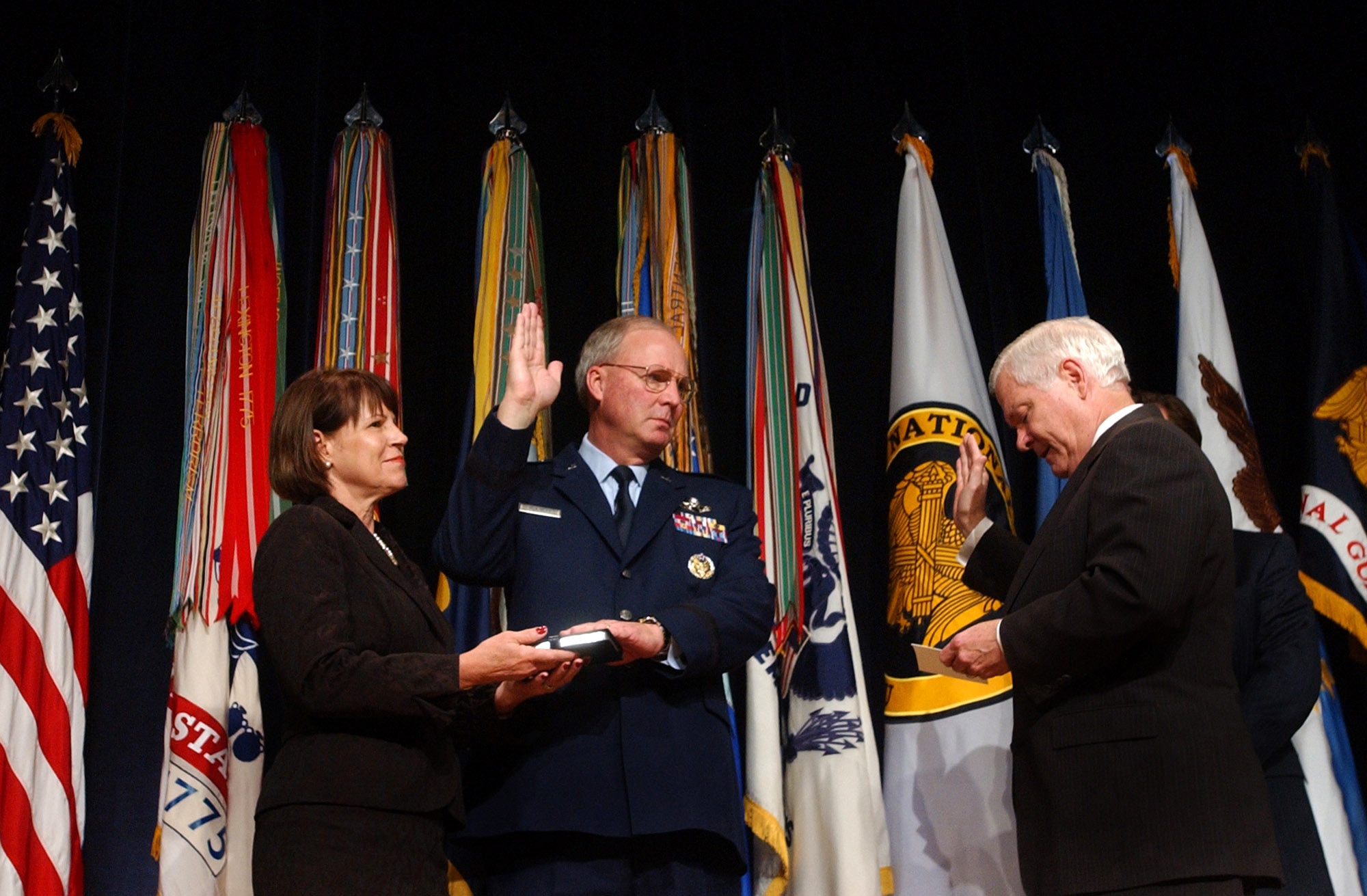 Gen. Craig R. McKinley is sworn in by Secretary of Defense Robert M. Gates as the 26th chief of the National Guard Bureau as his wife, Cheryl McKinley, holds a bible during a Nov. 17 ceremony at the Pentagon. General McKinley was also promoted to his current rank and is the first Guard officer to be promoted to the four-star rank. (U.S. Army photo/Staff Sgt. Jon Soucy)
