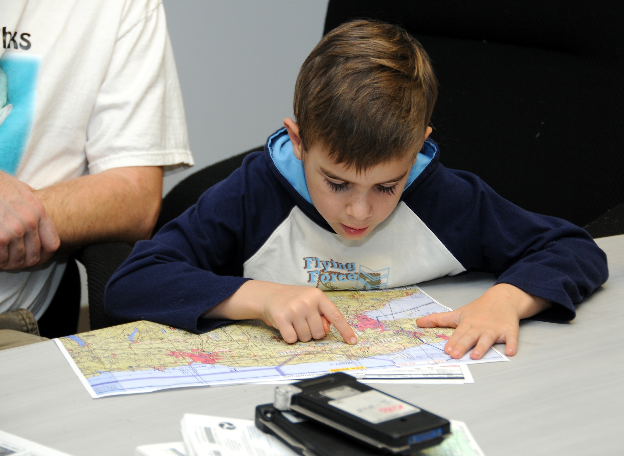 During the preflight briefing Hunter intently studies the map ensuring that he has no question of which way do I go?  