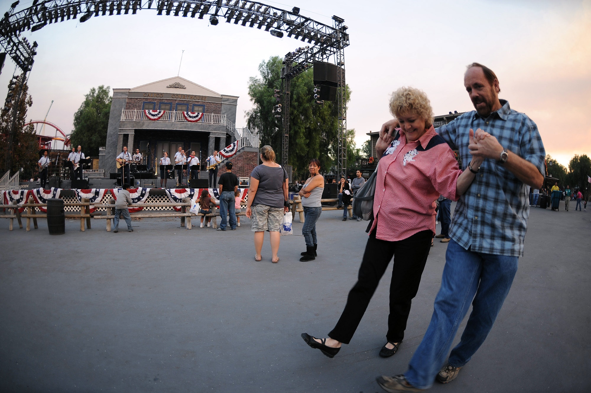Cheri Greer and John Foote two-step as members of the Air National Guard Band of The Southwest perform at Knott's Berry Farm Nov. 15 in Los Angeles. The band is performing during Air Force Week Los Angeles, which is an event designed to educate the local population about the Air Force's capabilities and missions through various activities and exhibitions all over the Los Angeles area. (U.S. Air Force photo/Staff Sgt. Desiree N. Palacios) 
