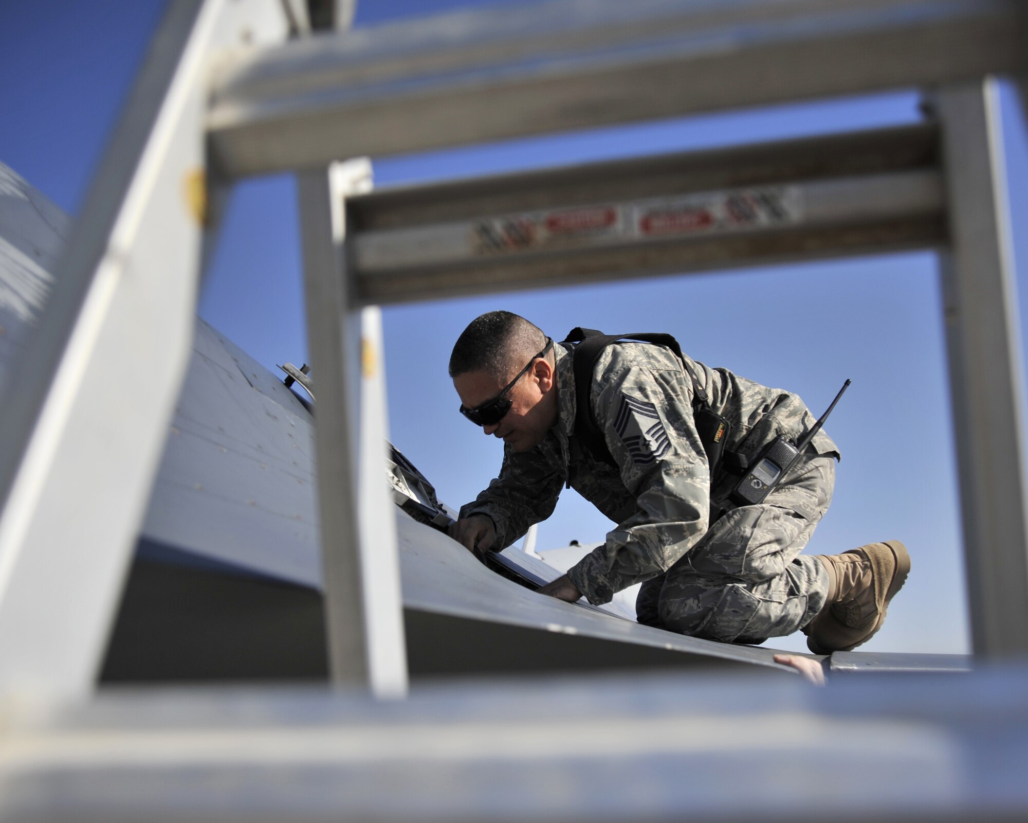 11/12/2008 ? SATHER AIR BASE, Iraq ? Chief Master Sgt. Pablo Valverde ensures the 20mm M61-A1 Gatling gun is properly made safe on an F-16 Fighting Falcon after the pilot of the aircraft made an emergency landing at Baghdad International Airport Nov. 12. Chief Valverde is the 447th Air Expeditionary Group superintendent, deployed from his position as the Command Chief with the 944th Fighter Wing, Luke Air Force Base, Ariz. He has spent most of his career as an aircraft weapons specialist for the F-4E Phantom fighter, the B-52 Stratofortress heavy bomber, and the F-16. (U.S. Air Force photo by Master Sgt. Brian Davidson)