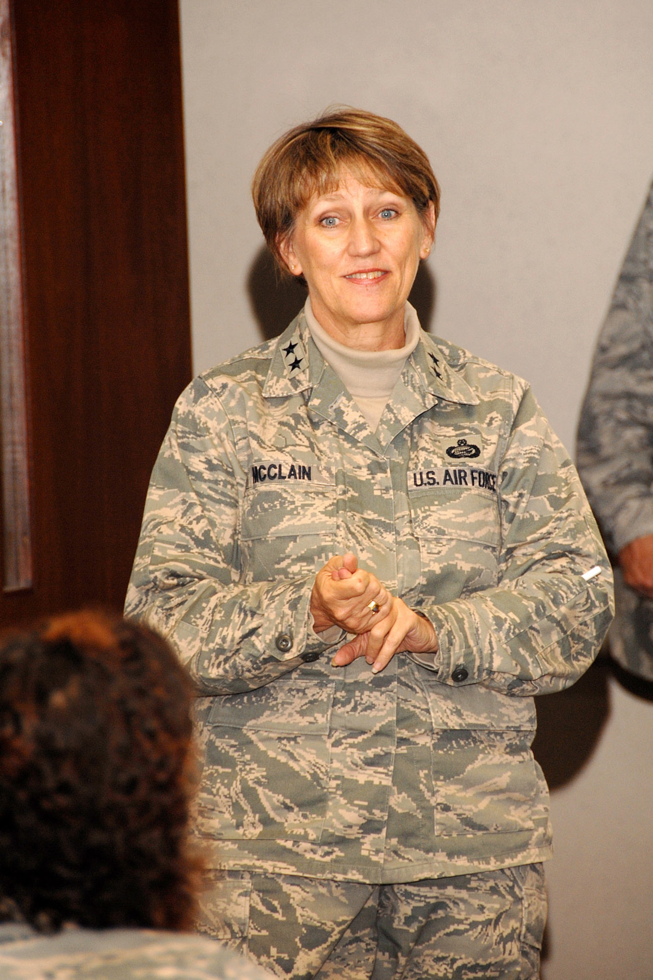 Maj. Gen. K.C. McClain, commander of the Air Force Personnel Center at Randolph Air Force Base, Texas, discusses consolidation of personnel functions with military personnel and civilians Nov. 13 during a visit to Wright-Patterson Air Force Base, Ohio. It was part of a three-day stop by AFPC's "Spread the Word" briefing team to update the base's workforce on personnel changes and to directly hear the workforce's concerns. (U.S. Air Force photo/Ben Strasser)