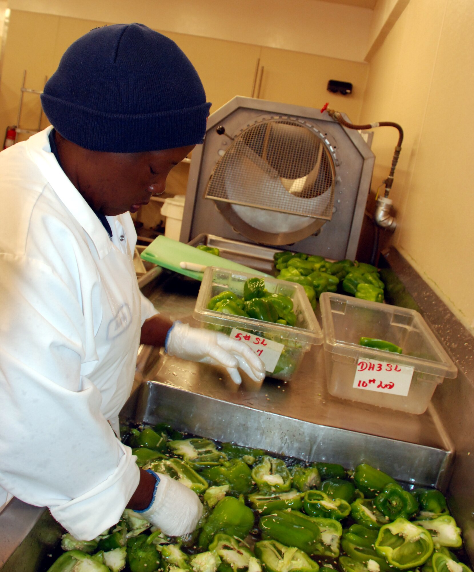 Beverly Young, a food processing specialist in food services, cleans and prepares vegetables at the Central Prep Kitchen to send to Sheppard's various dining facilities. Sheppard Food Services was recently awarded the 2009 AETC Hennessy Award Trophy for the Multiple Facilities category. (U.S. Air Force photo/Airman 1st Class Candy Miller) 
