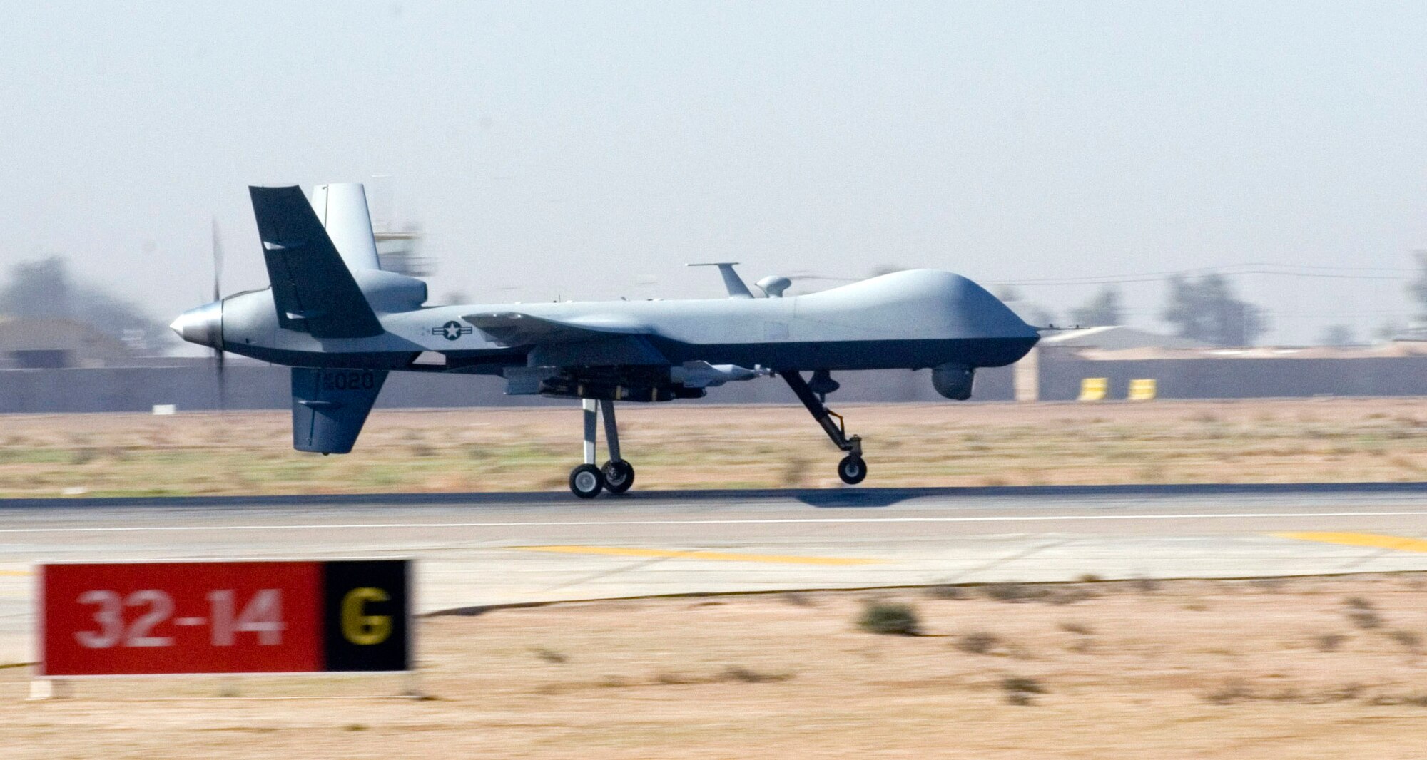 An MQ-9 Reaper unmanned aerial vehicle lands at Joint Base Balad, Iraq, Nov. 10. Reapers are remotely piloted and can linger over battlefields, providing persistent strike capabilities to ground force commanders. This Reaper is deployed to the 46th Expeditionary Reconnaissance and Attack Squadron from Creech Air Force Base, Nev. (U.S. Air Force photo/Tech. Sgt. Erik Gudmundson)