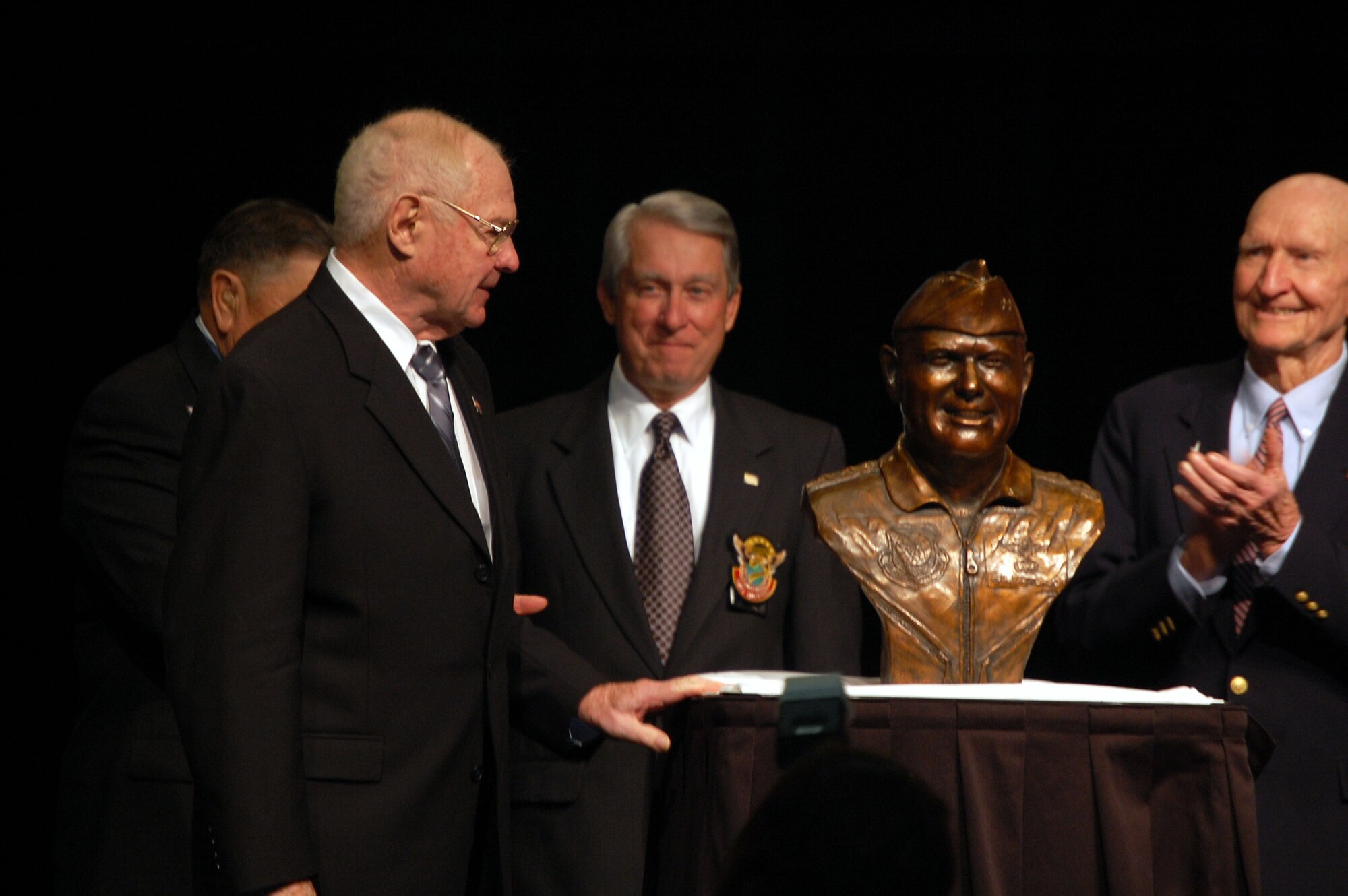 Retired Maj. Gen. Robert B. Patterson looks at a bronze statue bust made in his likeness during his induction into the Airlift/Tanker Association Hall of Fame Nov. 8 during the 2008 A/TA convention banquet in Anaheim, Calif.  (U.S. Air Force Photo/Tech. Sgt. Scott T. Sturkol)